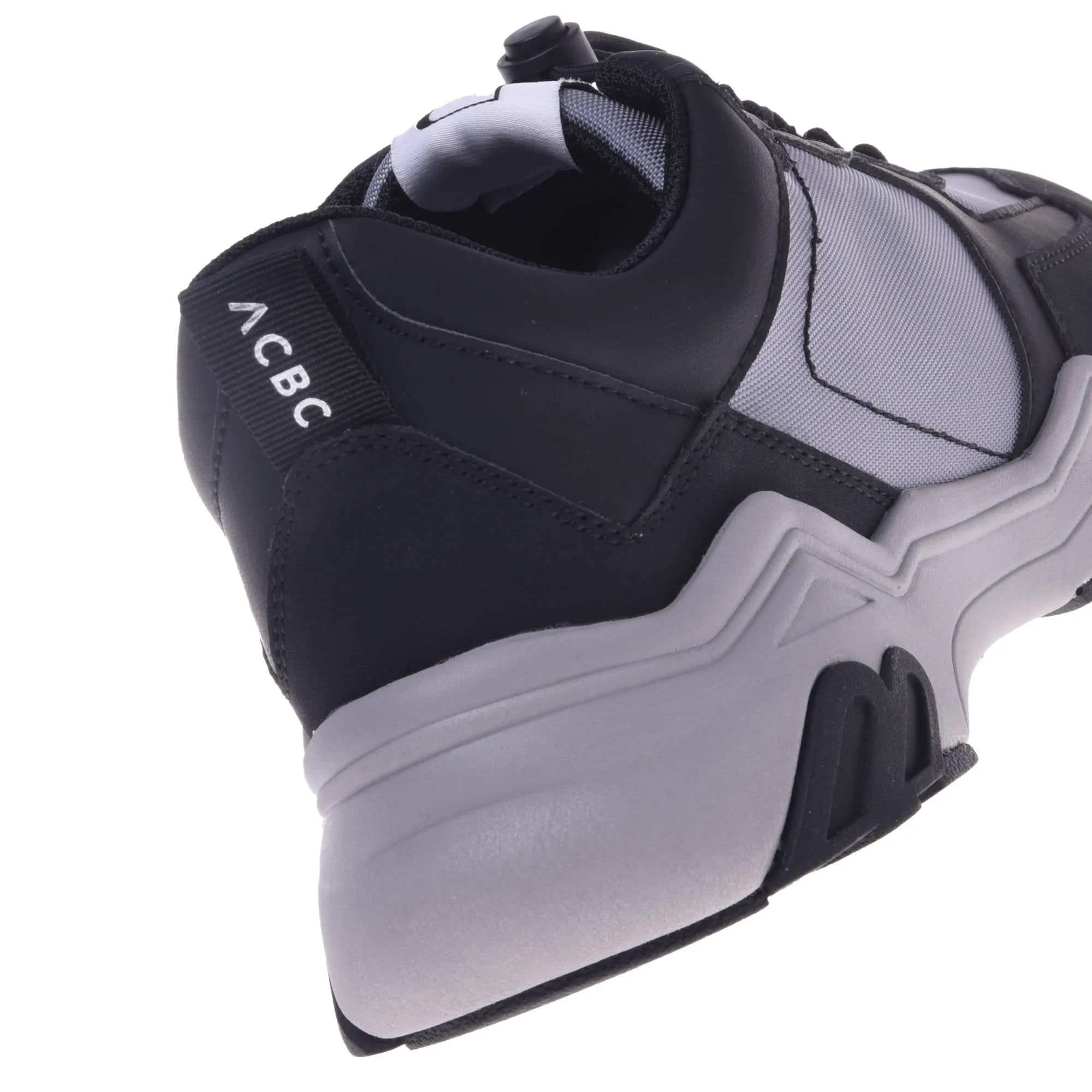 Trainers in black and grey eco-leather